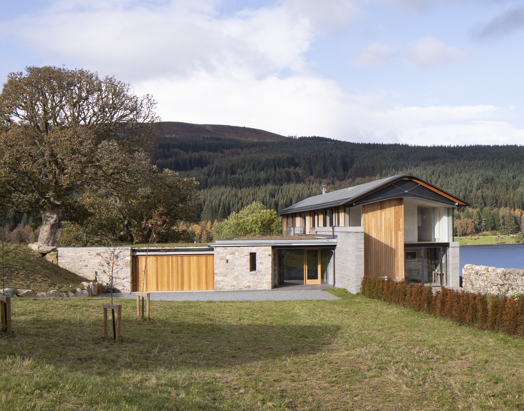 Benefits of specifying oak as a garage door material Architectural oak garage doors